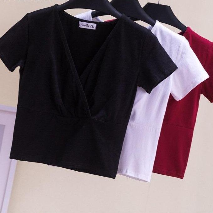 Damska koszulka w serek kopertowa-Bombardina.pl