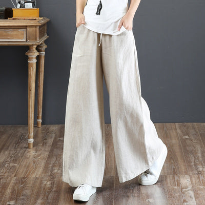 Damskie spodnie materiałowe z szerokimi nogawkami